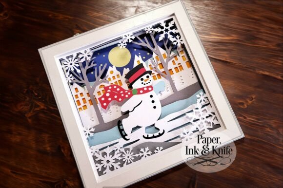 Explore Snowman Skating 3D Papercut Shadowbox